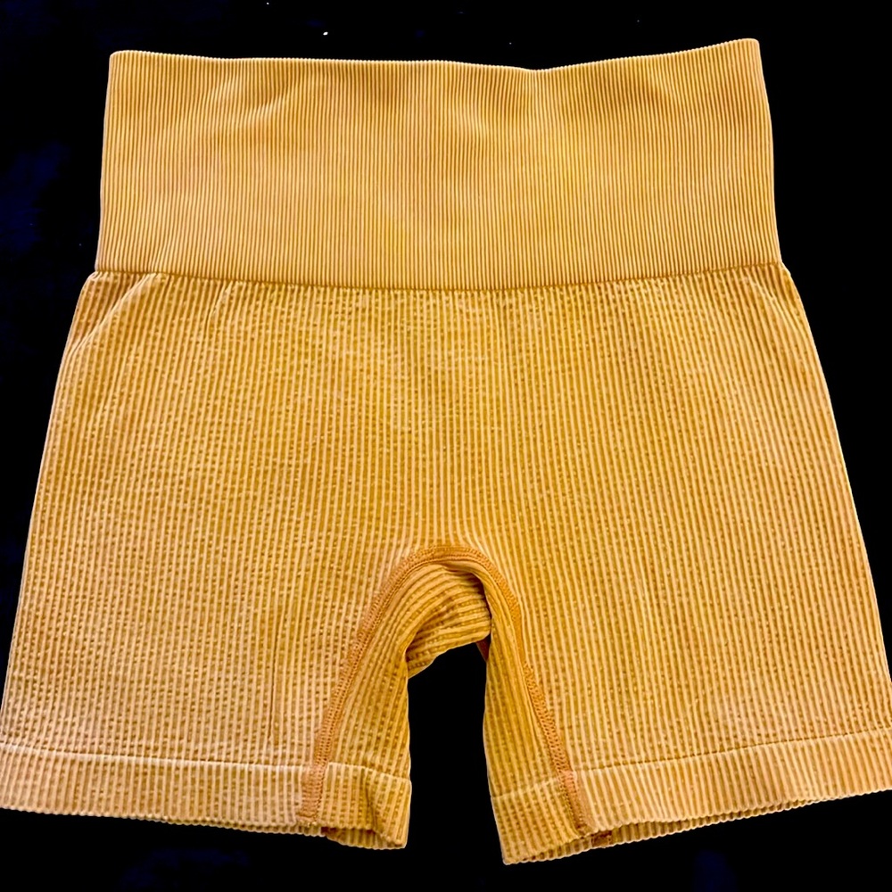 Colsie brand. Nylon/spandex workout shorts. Brand new without tags. Never worn.